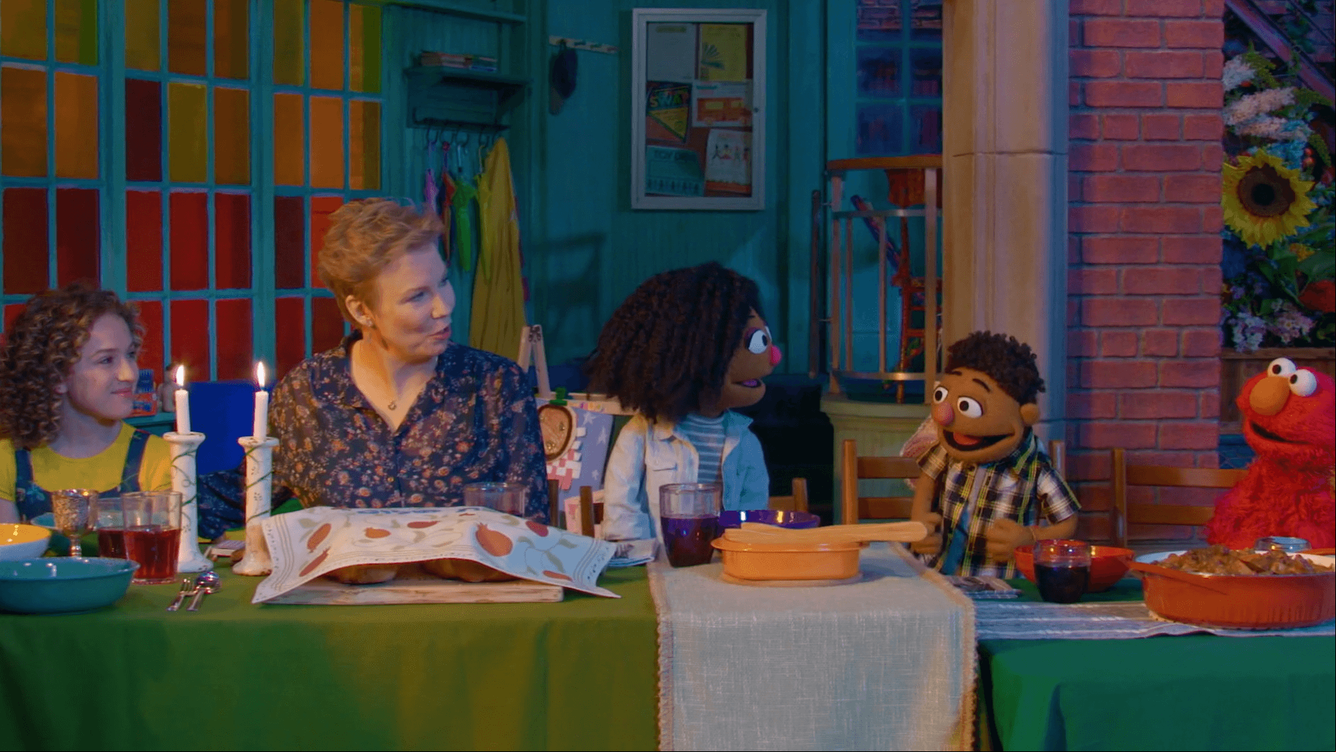 Charlie and her family have Shabbat dinner in the arbor and share their special meal with friends.
